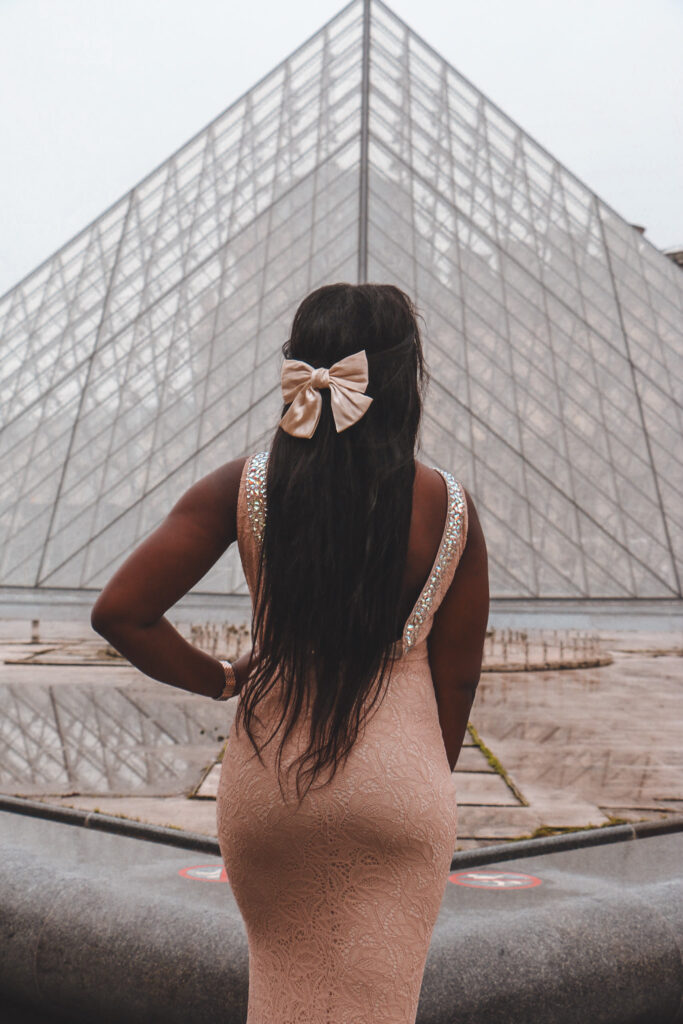 Louvre Museum glass pyramid with historic architecture – iconic photo spot in Paris